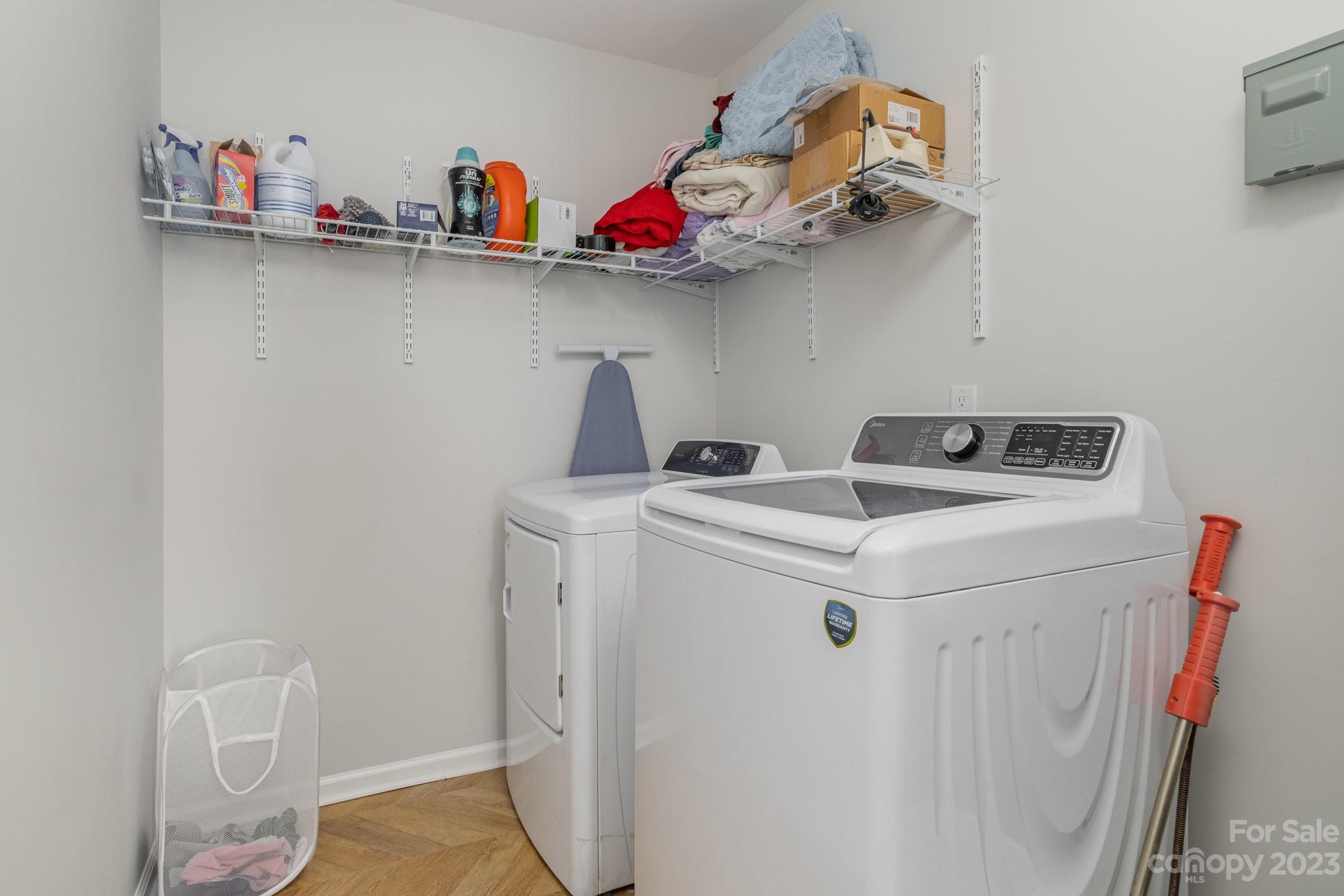 2213 Turtle Point Road Charlotte, NC 28262 - Photo 24 of 28 a utility room with dryer and washer