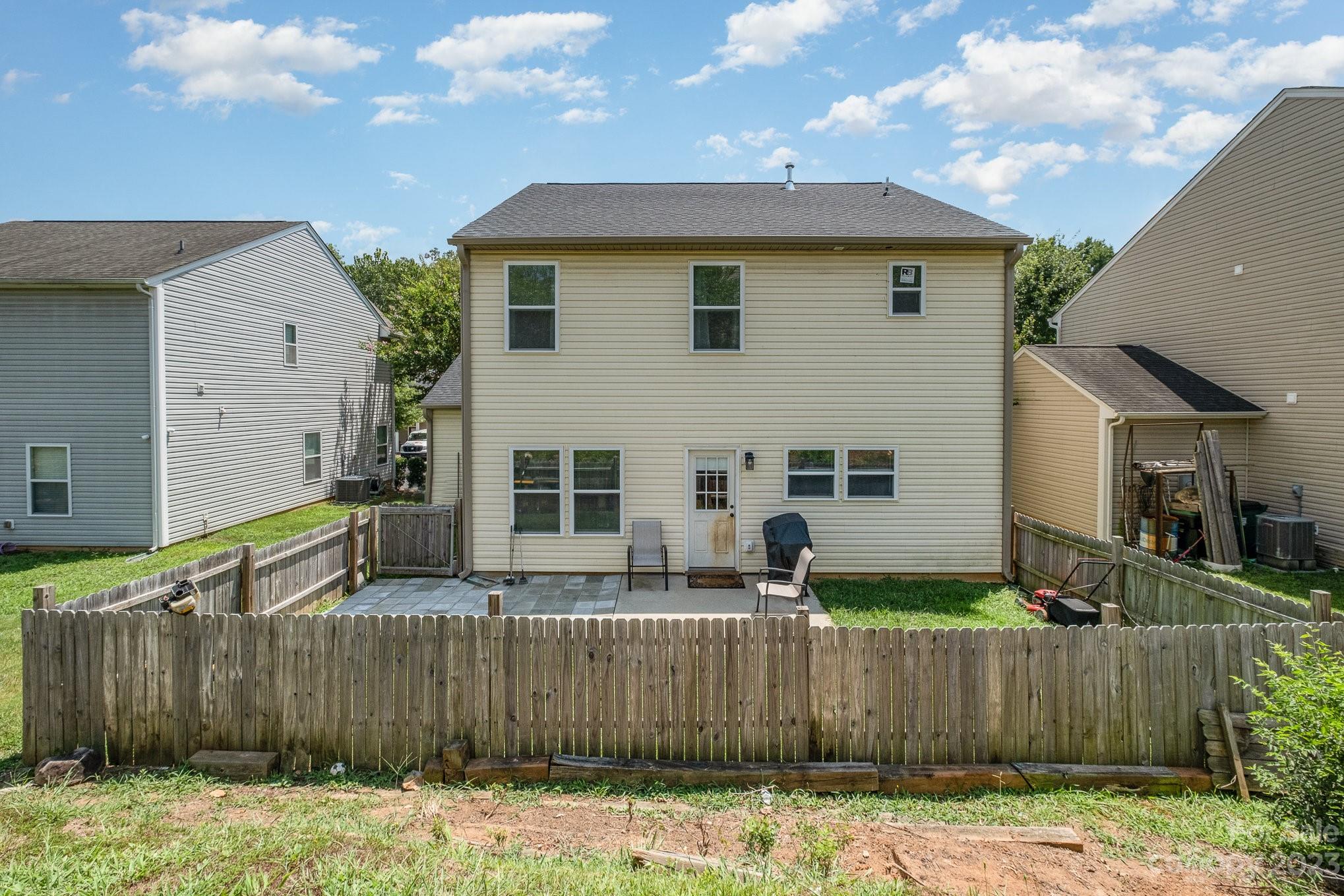 2213 Turtle Point Road Charlotte, NC 28262 - Photo 25 of 28 a view of a house with wooden fence