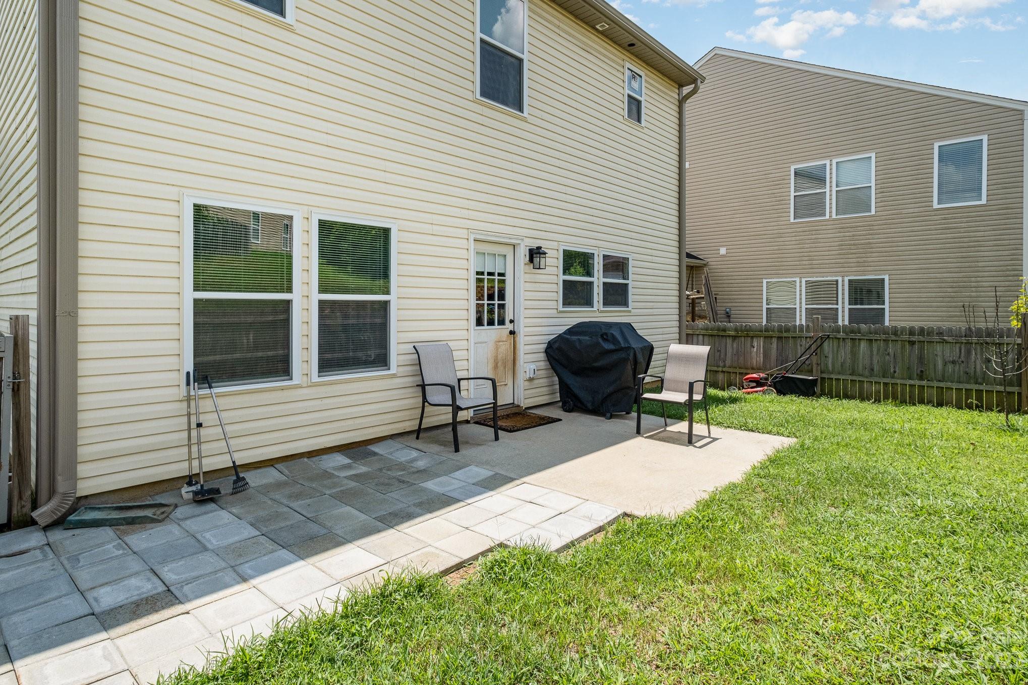 2213 Turtle Point Road Charlotte, NC 28262 - Photo 27 of 28 a view of a house with backyard and sitting area
