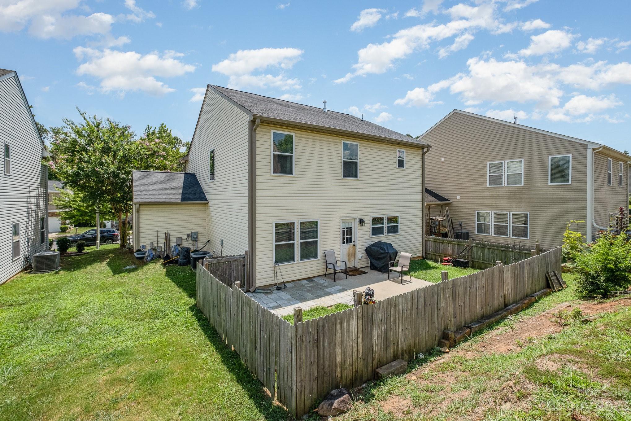 2213 Turtle Point Road Charlotte, NC 28262 - Photo 28 of 28 a view of a house with backyard and sitting area