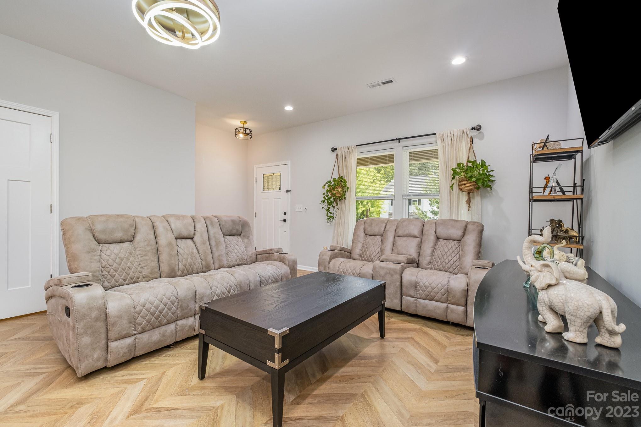 2213 Turtle Point Road Charlotte, NC 28262 - Photo 7 of 28 a living room with furniture and a large window