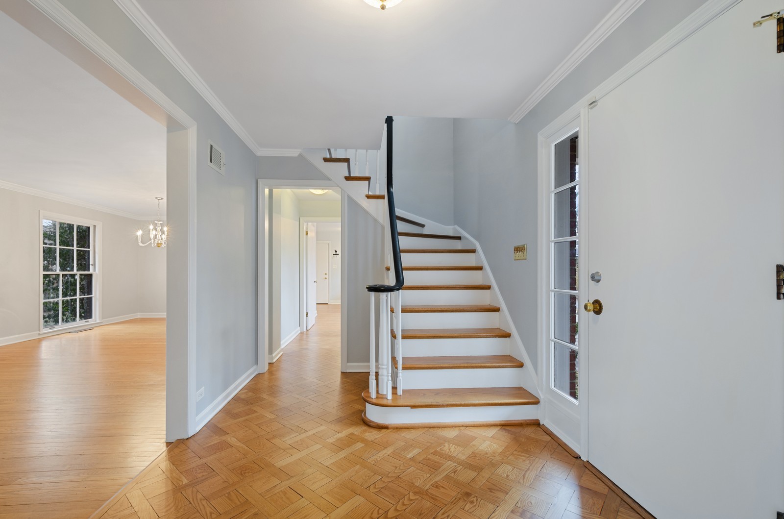 1347 Hackberry Lane Winnetka, IL 60093 - Photo 3 of 25 a view of entryway and hall with wooden floor