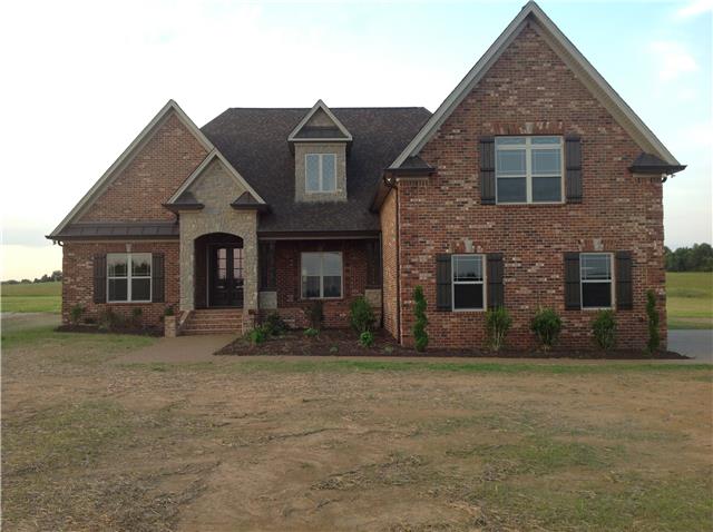 821 Double Log Cabin Road Lebanon, TN 37087 - Photo 1 of 16 a front view of a house with a yard