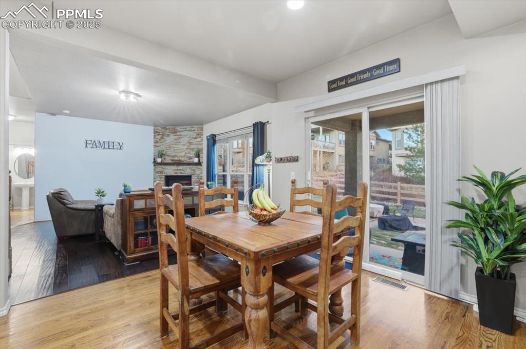 2374 Cinnabar Road Colorado Springs, CO 80921 - Photo 12 of 50 This sliding glass door opens to the back yard and opens automatically with the two included remotes or with the two sensors available for pet collars. You'll never have to get up to let the pets out again!