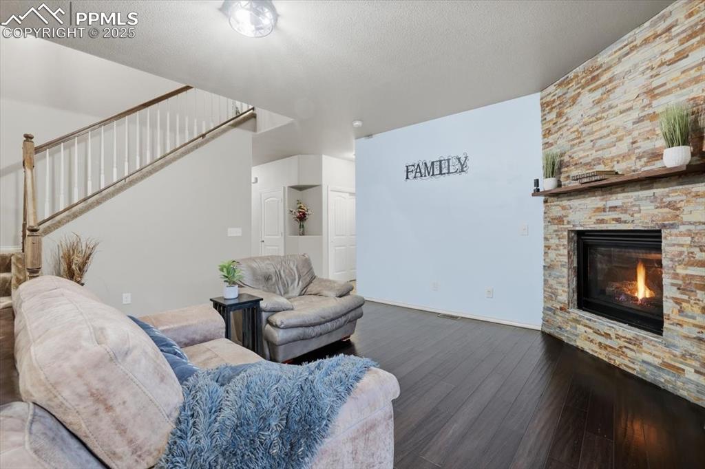 2374 Cinnabar Road Colorado Springs, CO 80921 - Photo 16 of 50 The hallway beyond the living area leads to the half bath and private office.