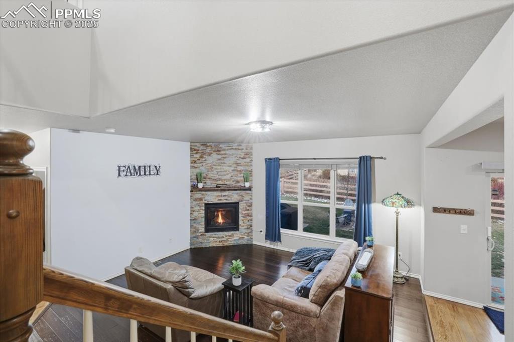 2374 Cinnabar Road Colorado Springs, CO 80921 - Photo 17 of 50 View of the living room from the stairs.