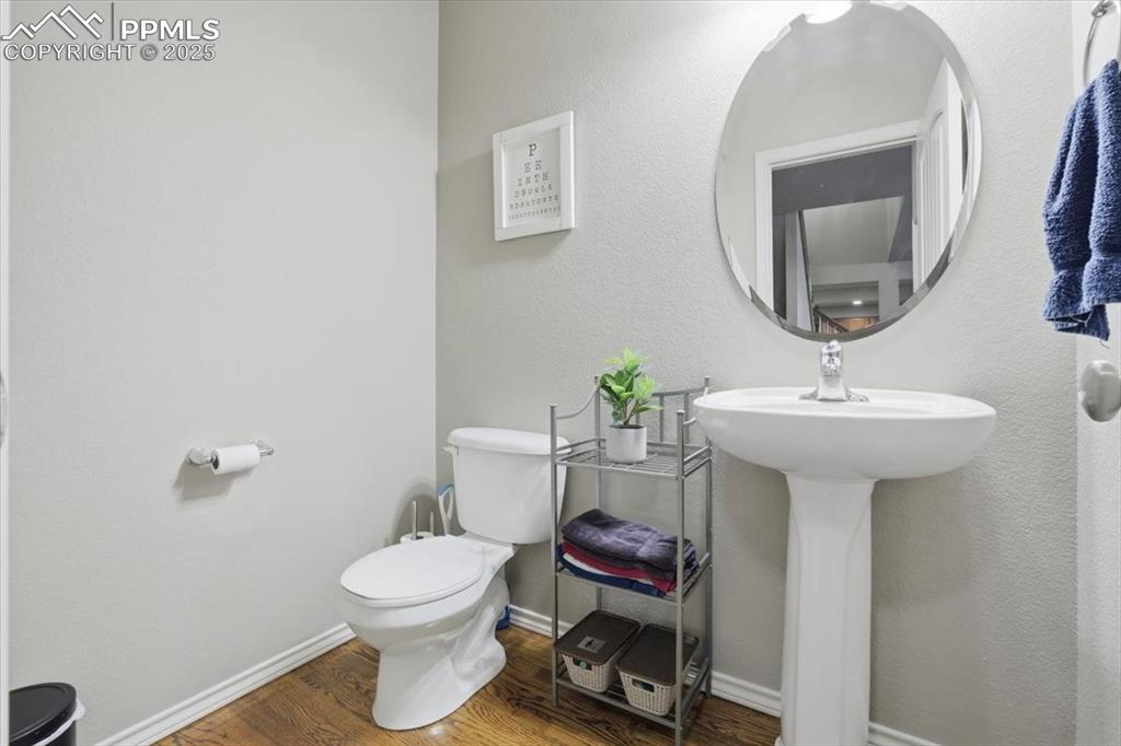 2374 Cinnabar Road Colorado Springs, CO 80921 - Photo 21 of 50 This half bath serves the main floor.