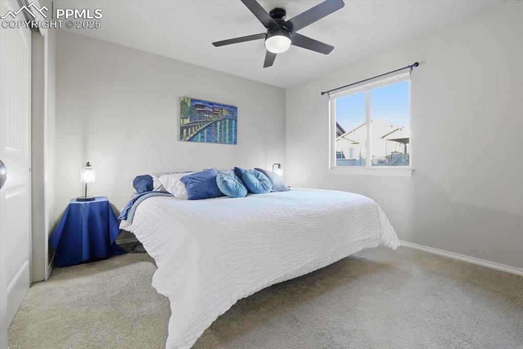 2374 Cinnabar Road Colorado Springs, CO 80921 - Photo 28 of 50 The second bedroom on the upper floor has room for a king-sized bed and all your furnishings.