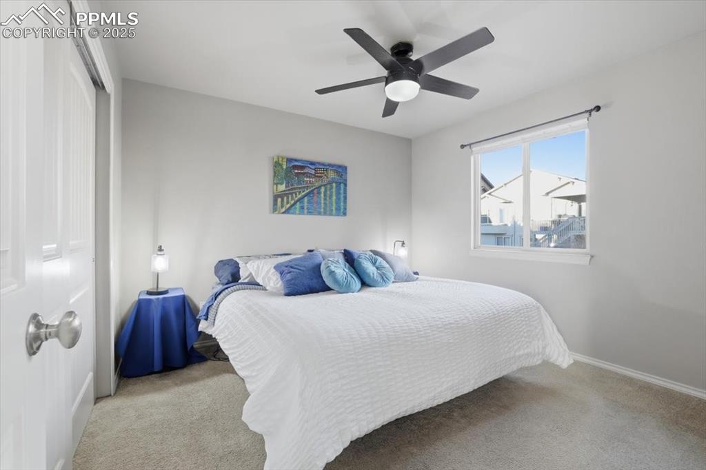 2374 Cinnabar Road Colorado Springs, CO 80921 - Photo 29 of 50 The second bedroom on the upper level has a double closet.