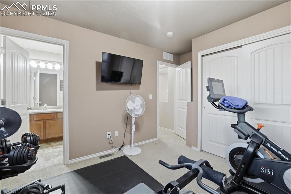 2374 Cinnabar Road Colorado Springs, CO 80921 - Photo 34 of 50 The fourth upper level bedroom is a JUNIOR SUITE with its' own private bath!
