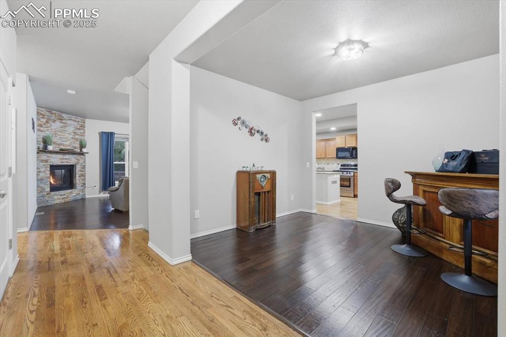 2374 Cinnabar Road Colorado Springs, CO 80921 - Photo 4 of 50 The formal dining room connects to the kitchen.