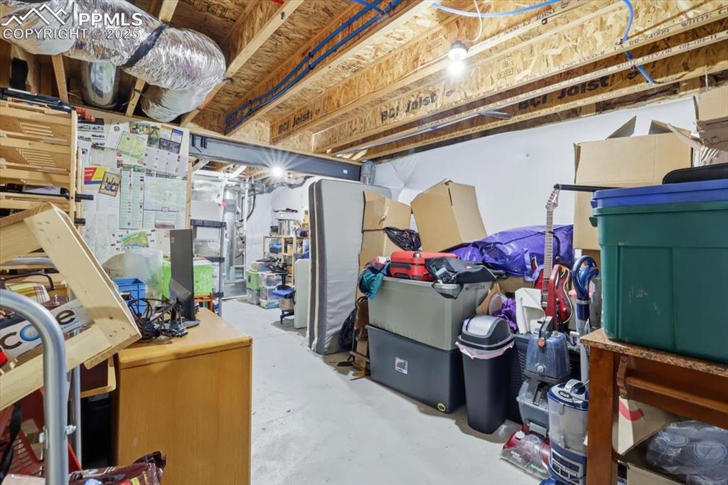 2374 Cinnabar Road Colorado Springs, CO 80921 - Photo 45 of 50 The basement storage room has included wine storage and room for all your stuff.