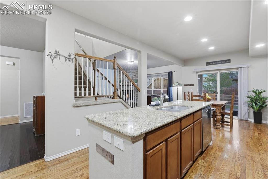 2374 Cinnabar Road Colorado Springs, CO 80921 - Photo 9 of 50 The kitchen is open to the formal dining room, informal dining area and living room.