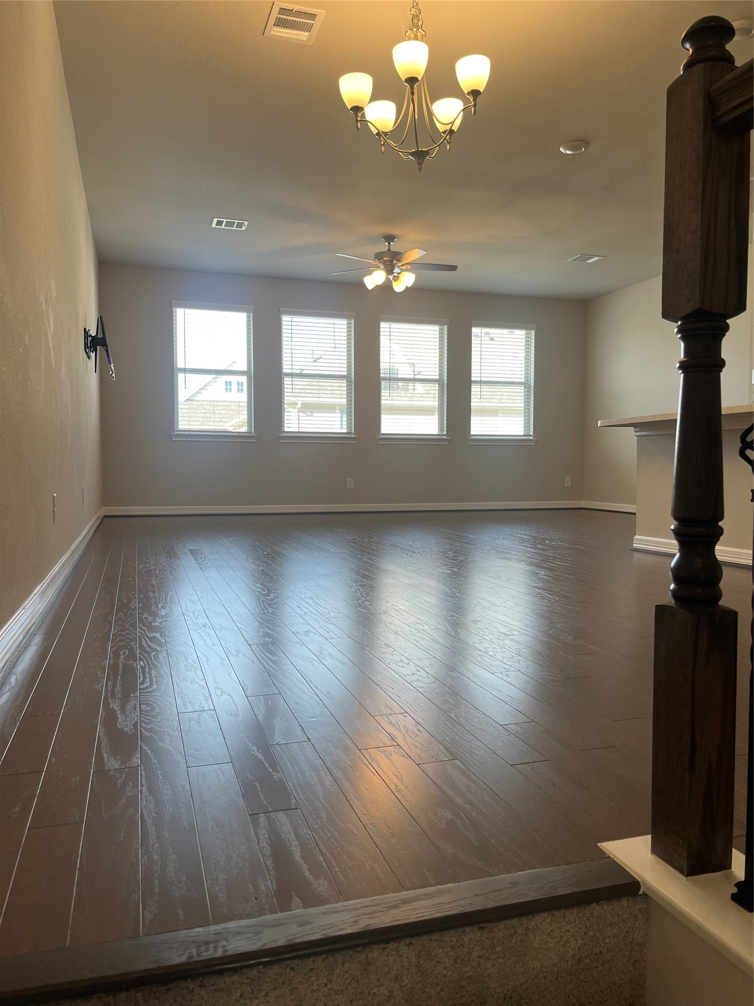9452 Caddo Ridge Lane Cypress, TX 77433 - Photo 16 of 35 wooden floor in an empty room with a window