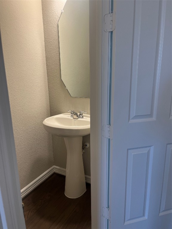9452 Caddo Ridge Lane Cypress, TX 77433 - Photo 22 of 35 a bathroom with a sink and mirror