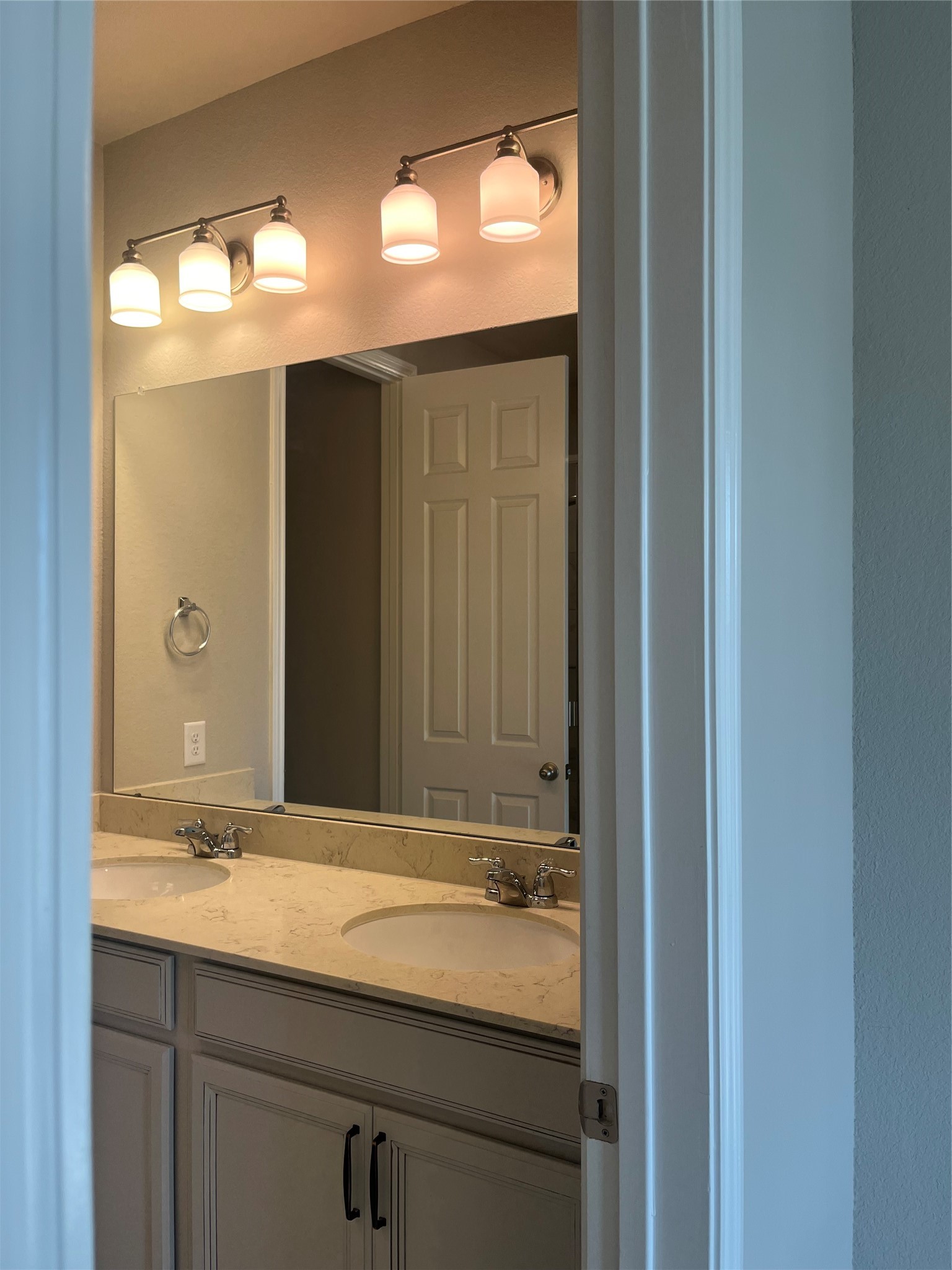 9452 Caddo Ridge Lane Cypress, TX 77433 - Photo 29 of 35 a bathroom with a sink and a mirror