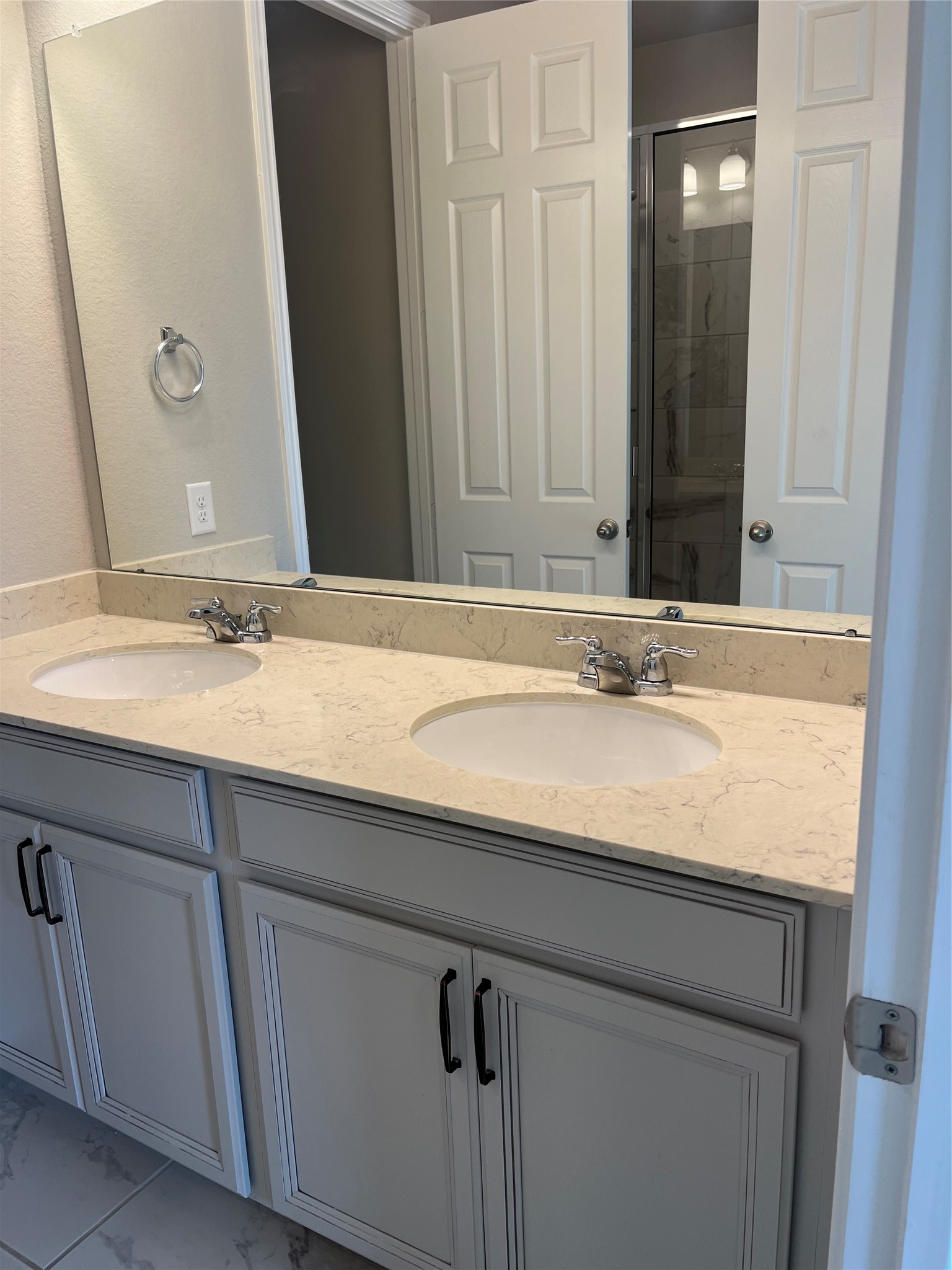 9452 Caddo Ridge Lane Cypress, TX 77433 - Photo 30 of 35 a bathroom with a granite countertop sink and a mirror