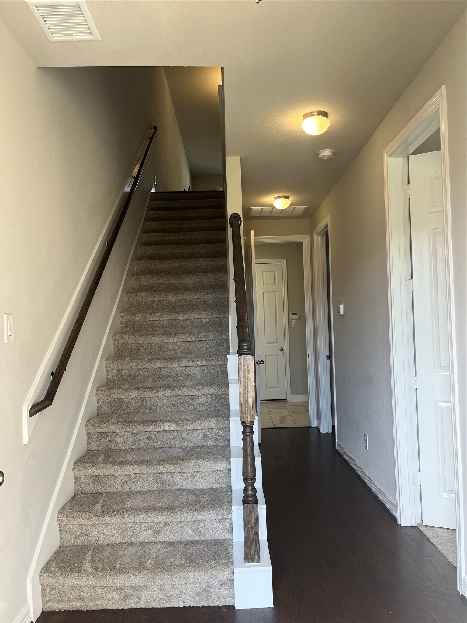9452 Caddo Ridge Lane Cypress, TX 77433 - Photo 5 of 35 a view of entryway and hall with wooden floor
