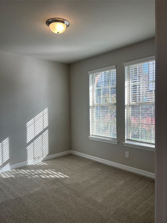 9452 Caddo Ridge Lane Cypress, TX 77433 - Photo 6 of 35 an empty room with a window