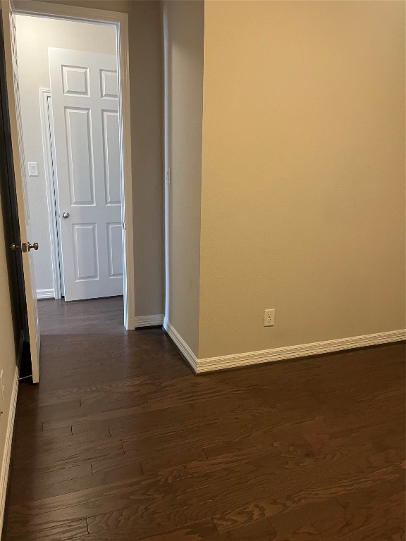 9452 Caddo Ridge Lane Cypress, TX 77433 - Photo 10 of 35 an empty room with wooden floor