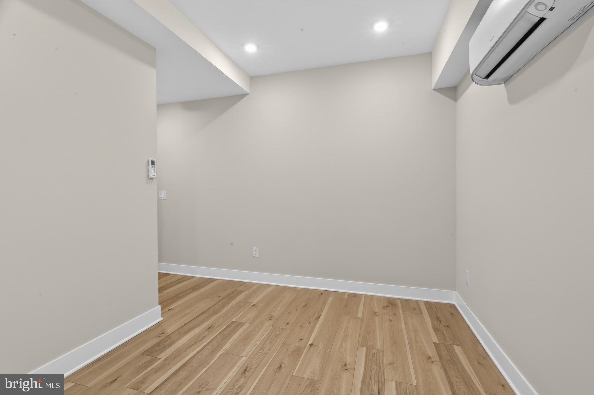 5230 Walnut Street, Unit 2F Philadelphia, PA 19139 - Photo 11 of 21 a view of a room with wooden floor