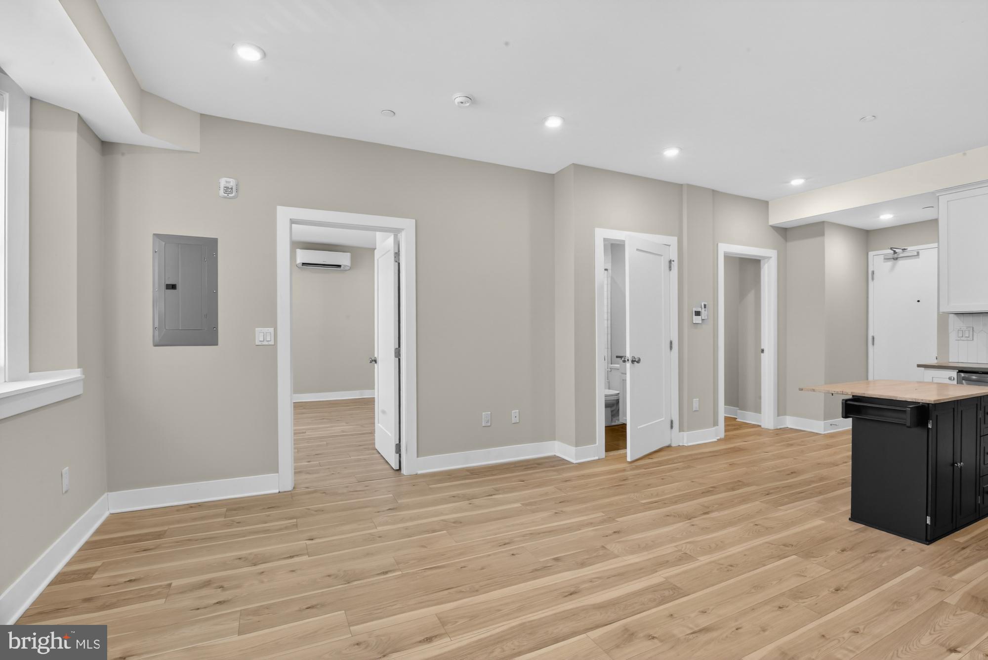 5230 Walnut Street, Unit 2F Philadelphia, PA 19139 - Photo 7 of 21 a view of empty room with wooden floor