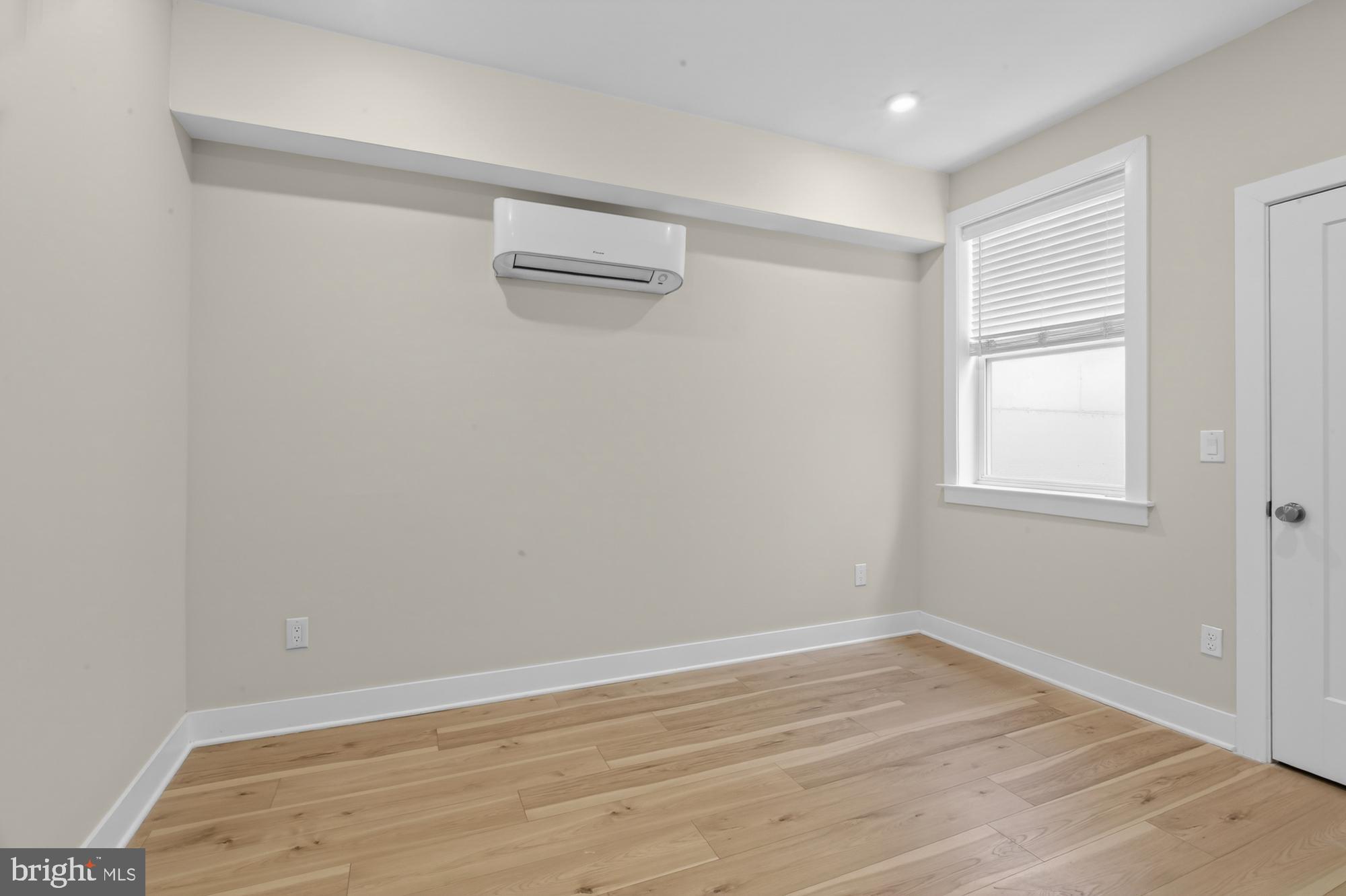5230 Walnut Street, Unit 2F Philadelphia, PA 19139 - Photo 9 of 21 a view of a room with wooden floor and fan