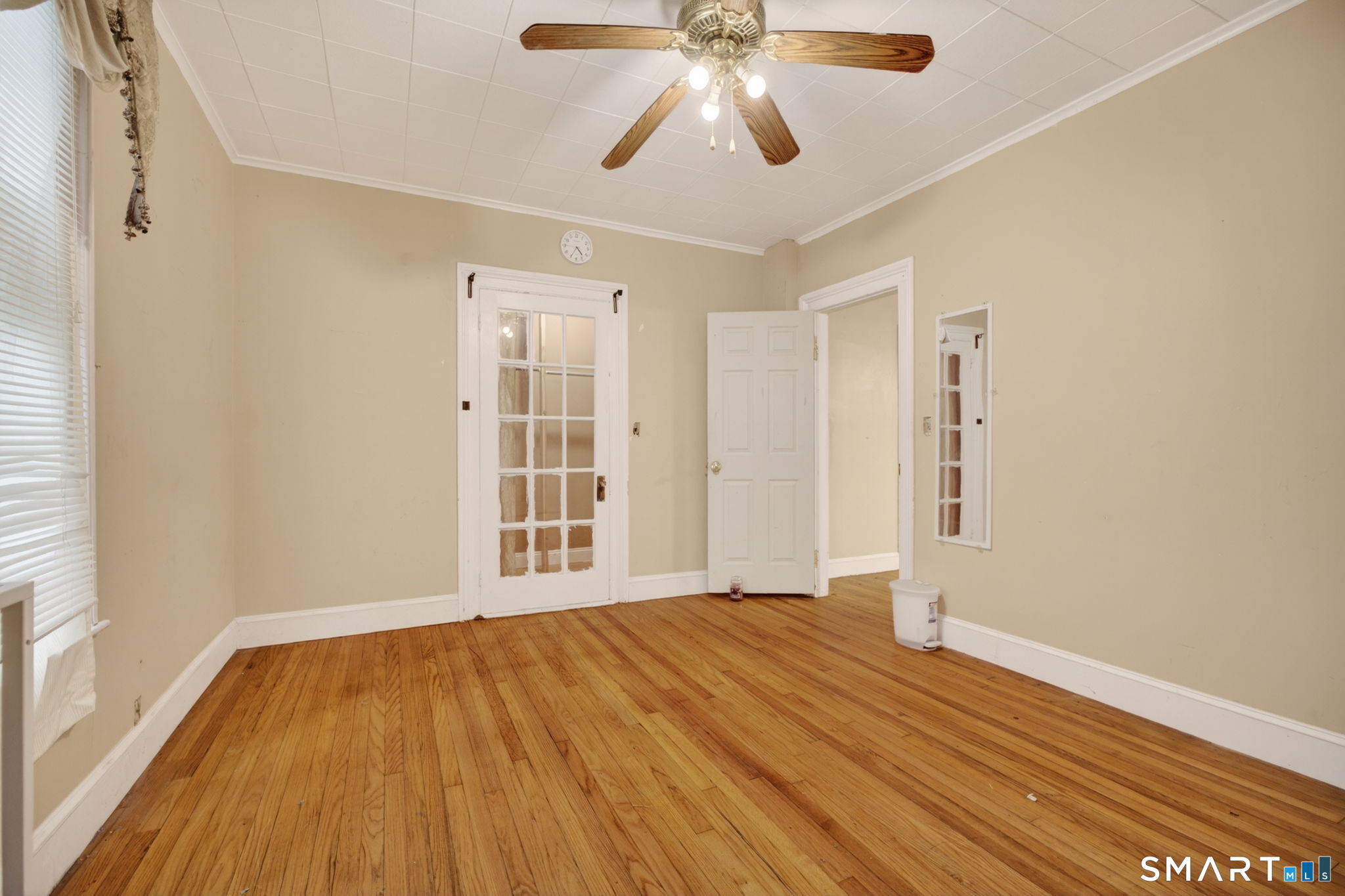 670 Hanover Road Meriden, CT 06451 - Photo 21 of 40 wooden floor in an empty room with a window