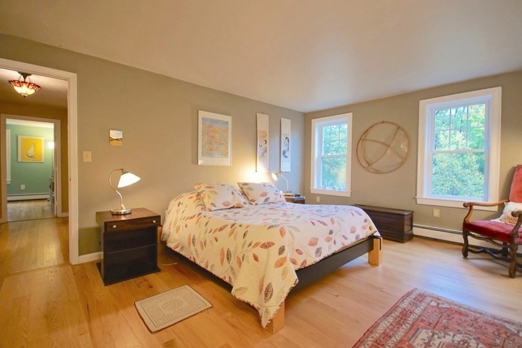 56 Boston Road Newbury, MA 01951 - Photo 20 of 31 a bed room with a bed and window