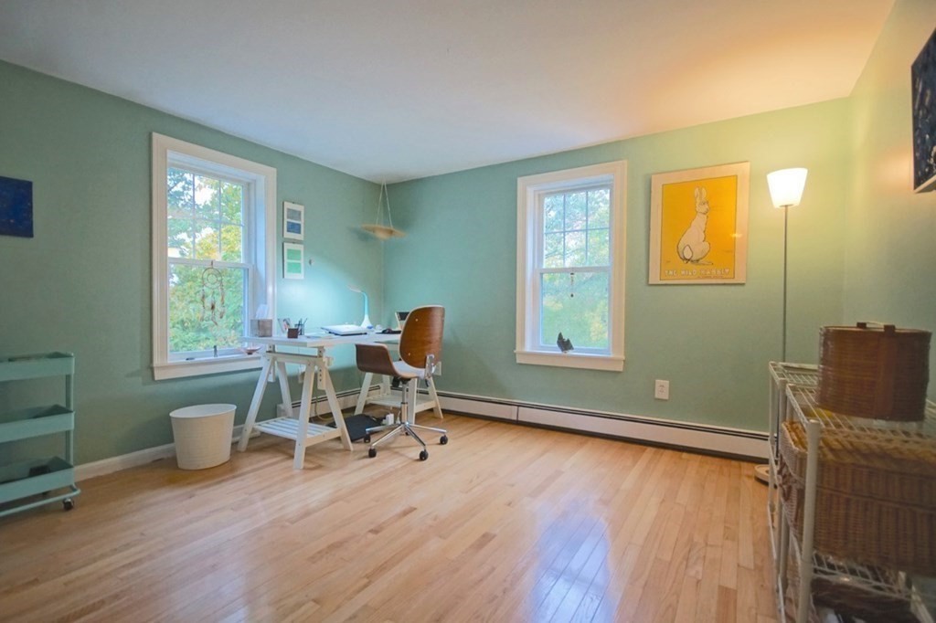56 Boston Road Newbury, MA 01951 - Photo 24 of 31 a work room with furniture and a window