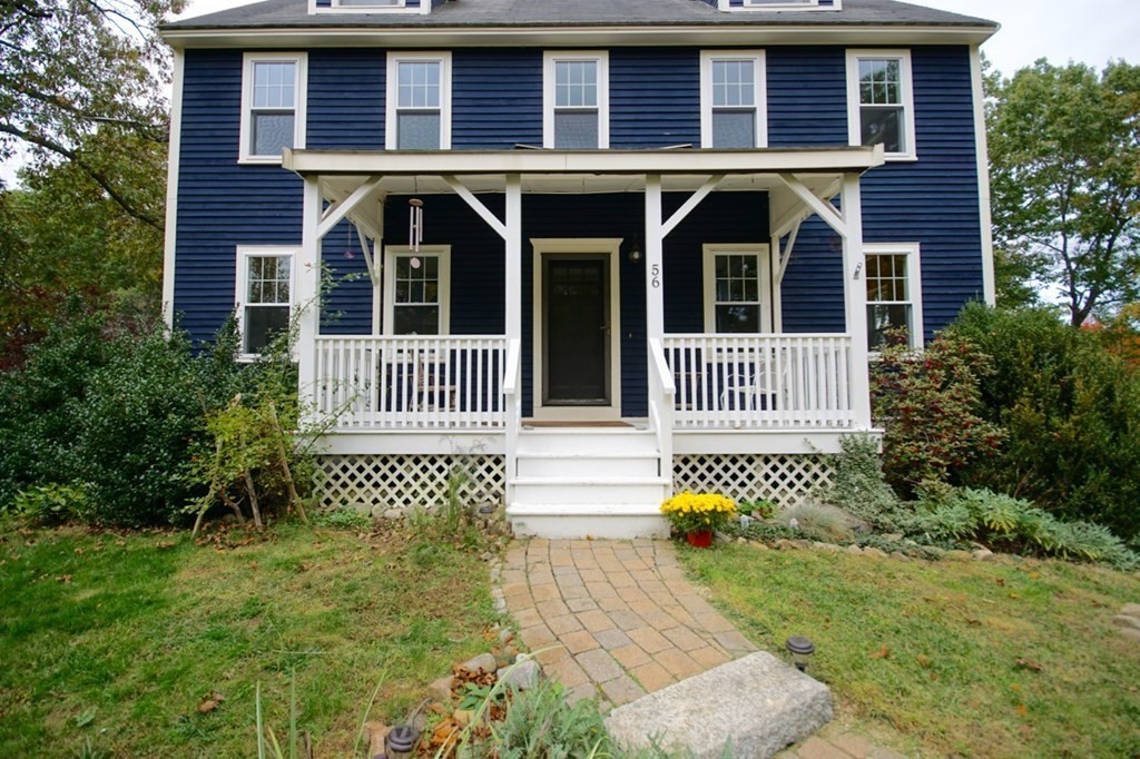 56 Boston Road Newbury, MA 01951 - Photo 3 of 31 a front view of a house with a garden