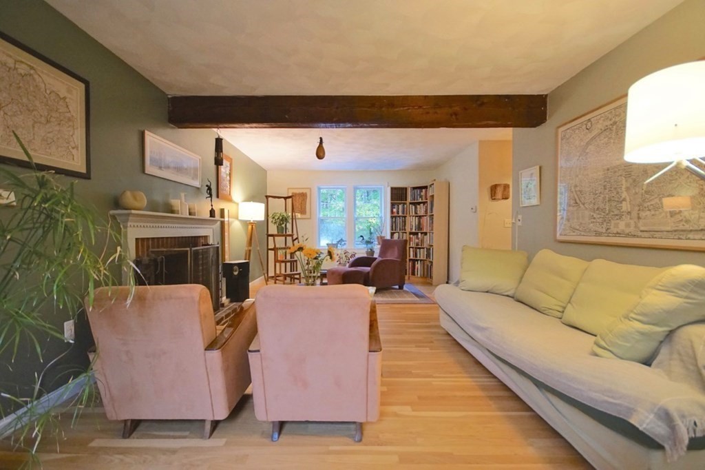 56 Boston Road Newbury, MA 01951 - Photo 7 of 31 a living room with furniture and a fireplace