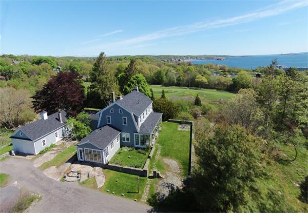 an aerial view of a house with mountain view
