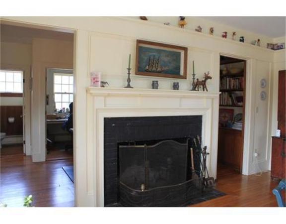 45 Links Road Gloucester, MA 01930 - Photo 11 of 17 a living room with furniture and a fireplace