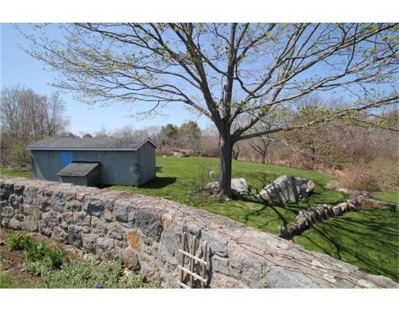 45 Links Road Gloucester, MA 01930 - Photo 16 of 17 a backyard of a house with a table and chairs