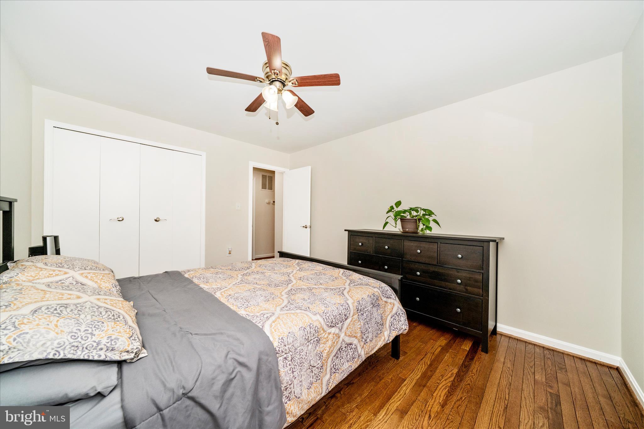 16000 Narrows Terrace Silver Spring, MD 20906 - Photo 33 of 54 a bedroom with a bed and a dresser