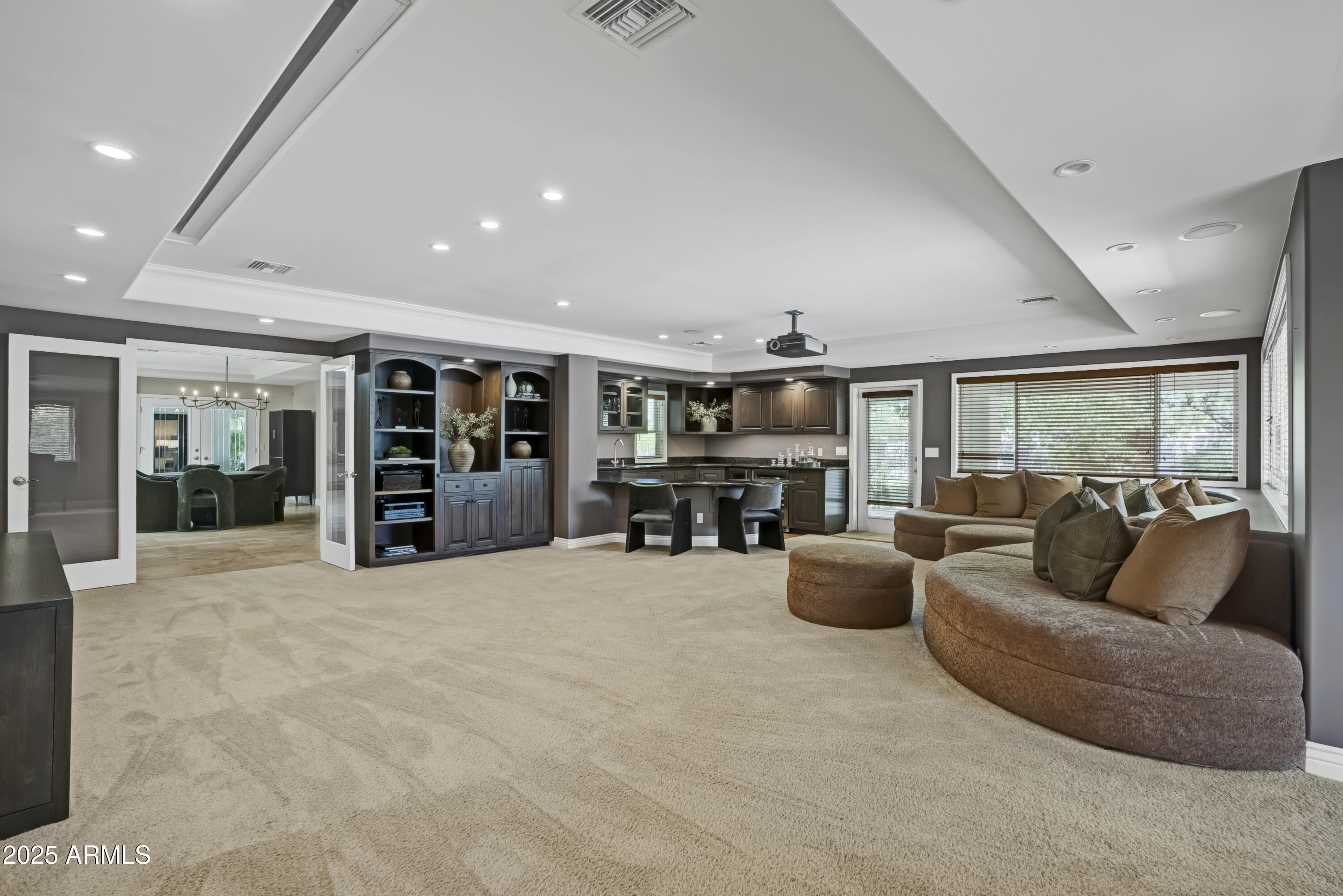 9236 North 52nd Place Paradise Valley, AZ 85253 - Photo 11 of 56 a living room with furniture and large window
