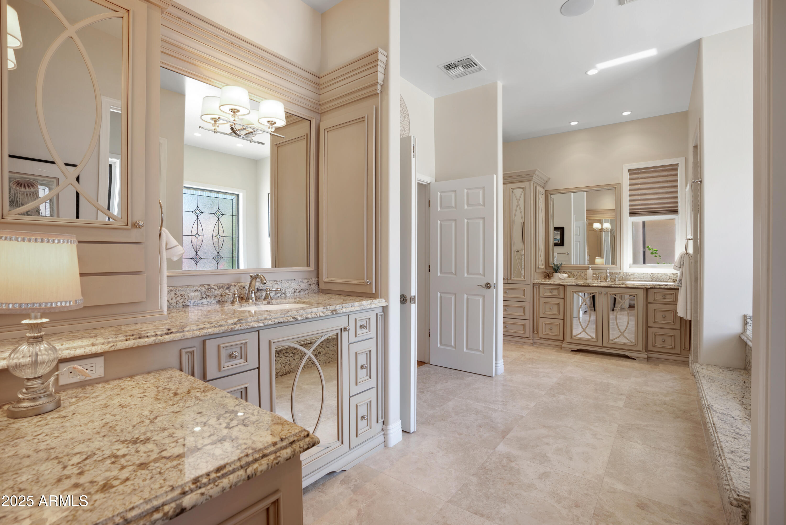 9236 North 52nd Place Paradise Valley, AZ 85253 - Photo 20 of 56 a bathroom with a granite countertop sink mirror and a bathtub