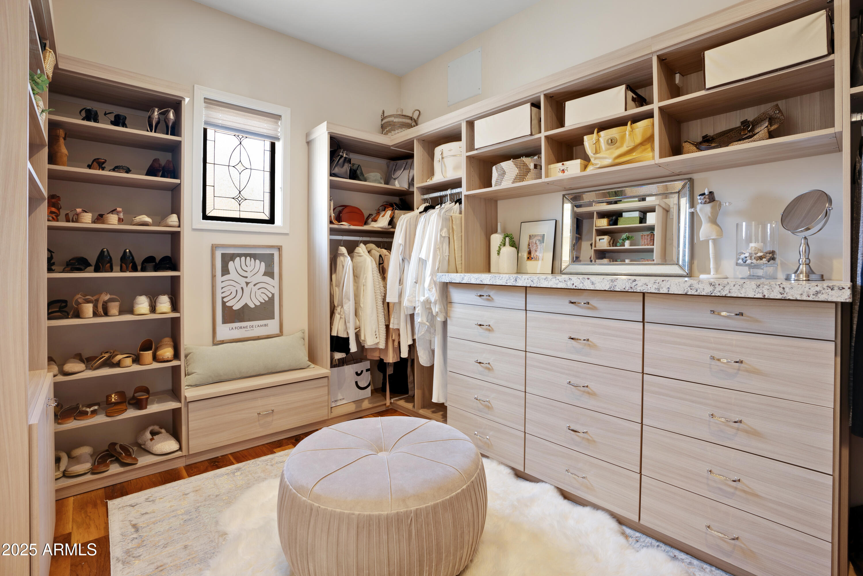 9236 North 52nd Place Paradise Valley, AZ 85253 - Photo 23 of 56 a living room with furniture a rug and a window