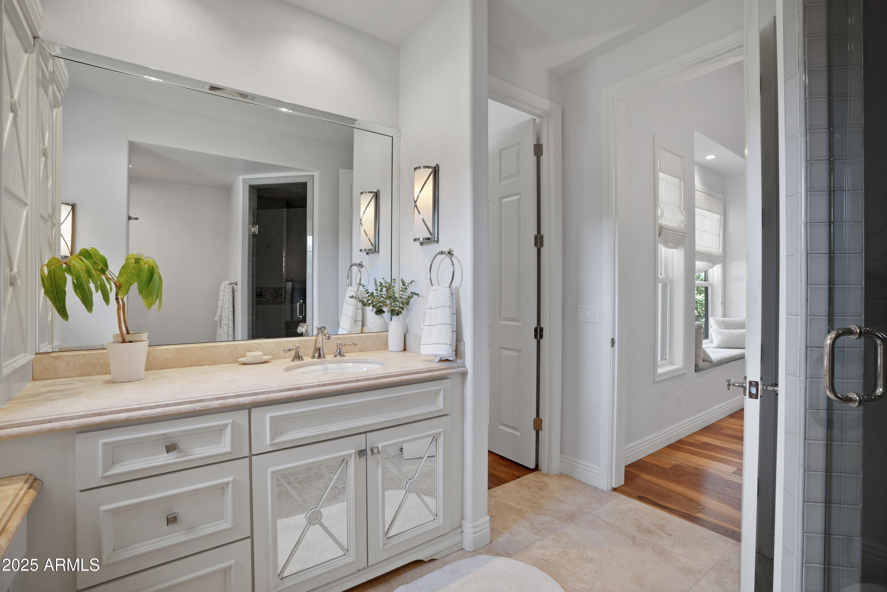 9236 North 52nd Place Paradise Valley, AZ 85253 - Photo 26 of 56 a bathroom with a sink and a mirror