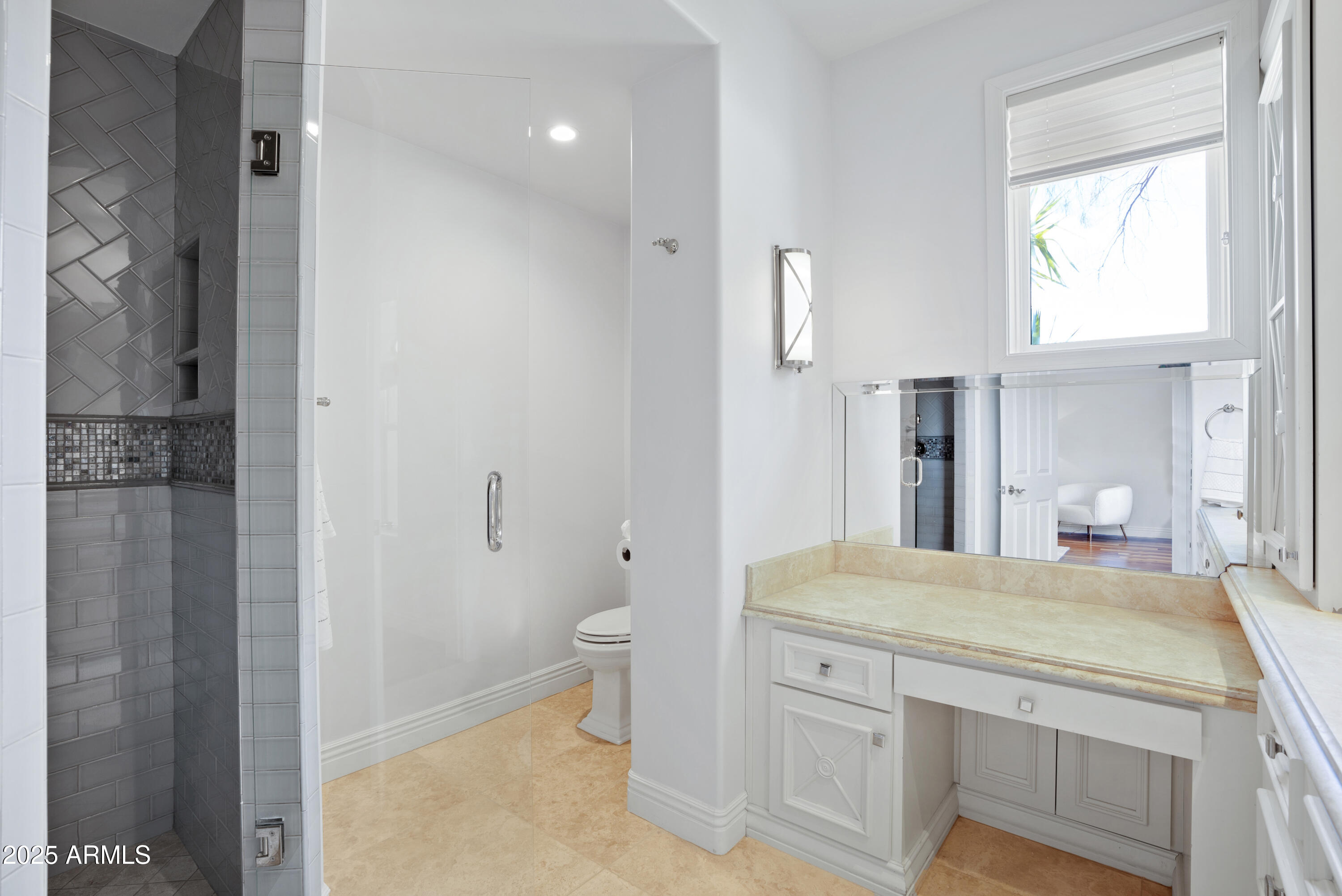 9236 North 52nd Place Paradise Valley, AZ 85253 - Photo 27 of 56 a bathroom with a granite countertop sink a toilet and a shower