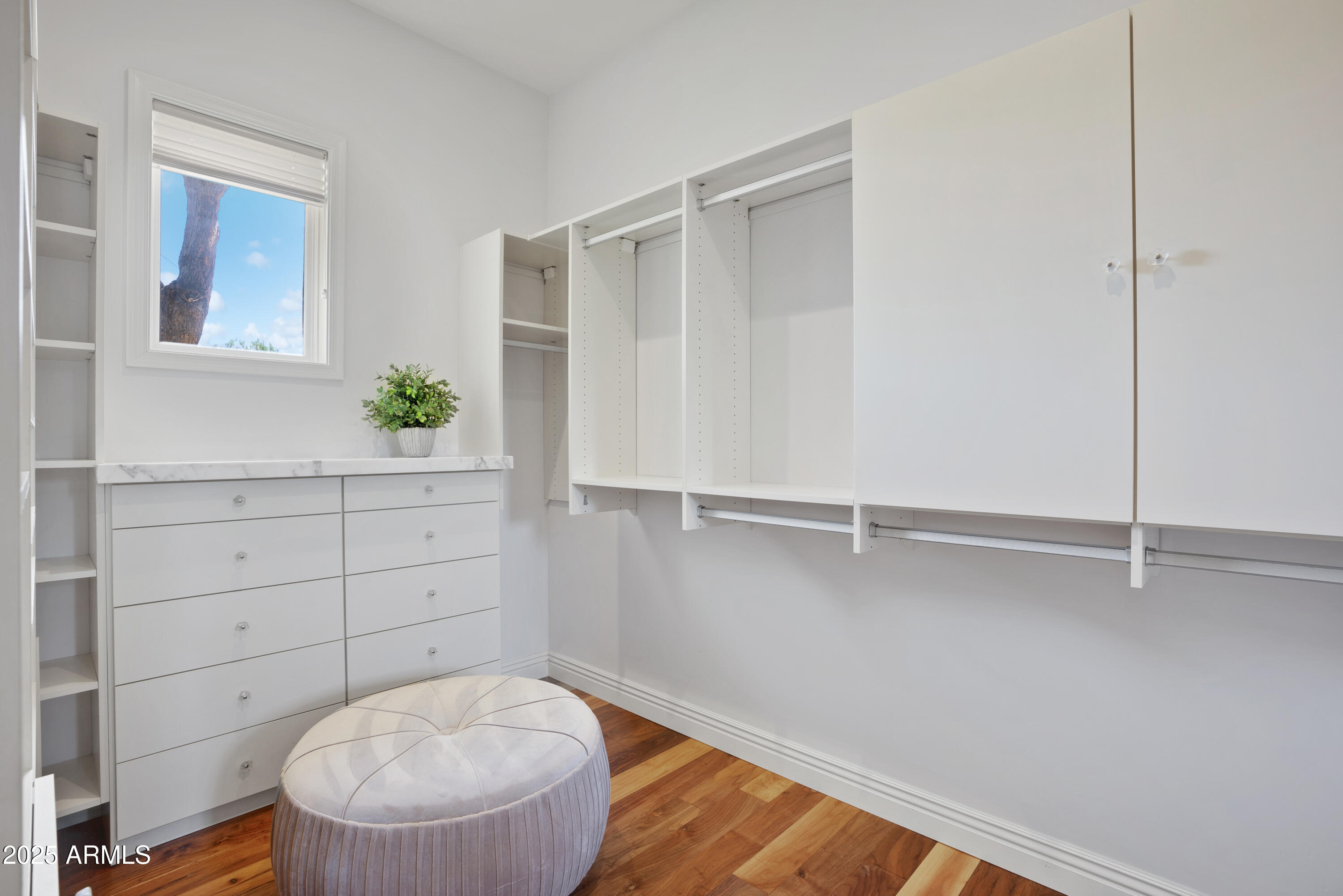 9236 North 52nd Place Paradise Valley, AZ 85253 - Photo 28 of 56 a room with a hardwood and a window