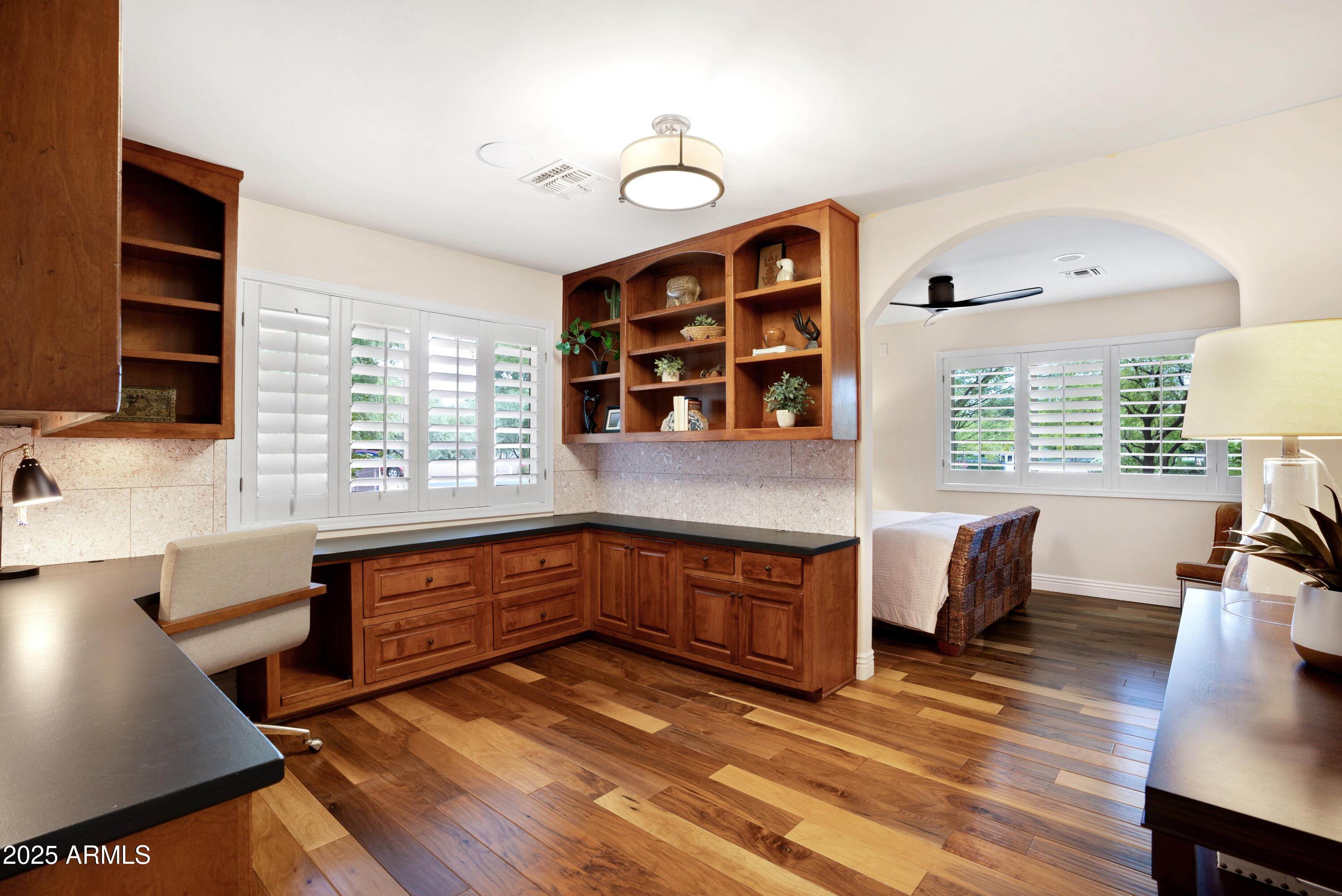 9236 North 52nd Place Paradise Valley, AZ 85253 - Photo 31 of 56 a kitchen with stainless steel appliances granite countertop a stove and a wooden cabinets