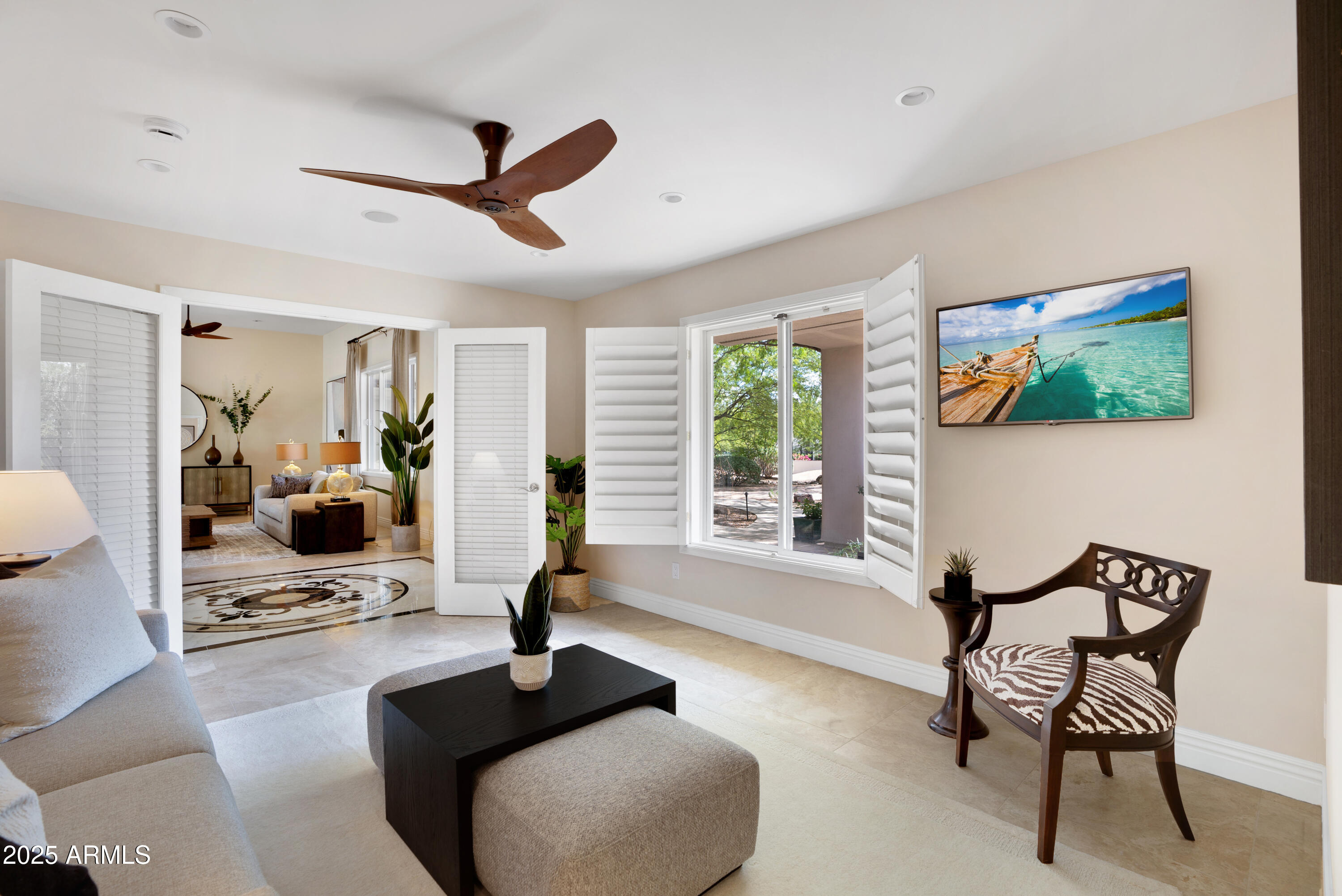 9236 North 52nd Place Paradise Valley, AZ 85253 - Photo 34 of 56 a living room with furniture and a large window