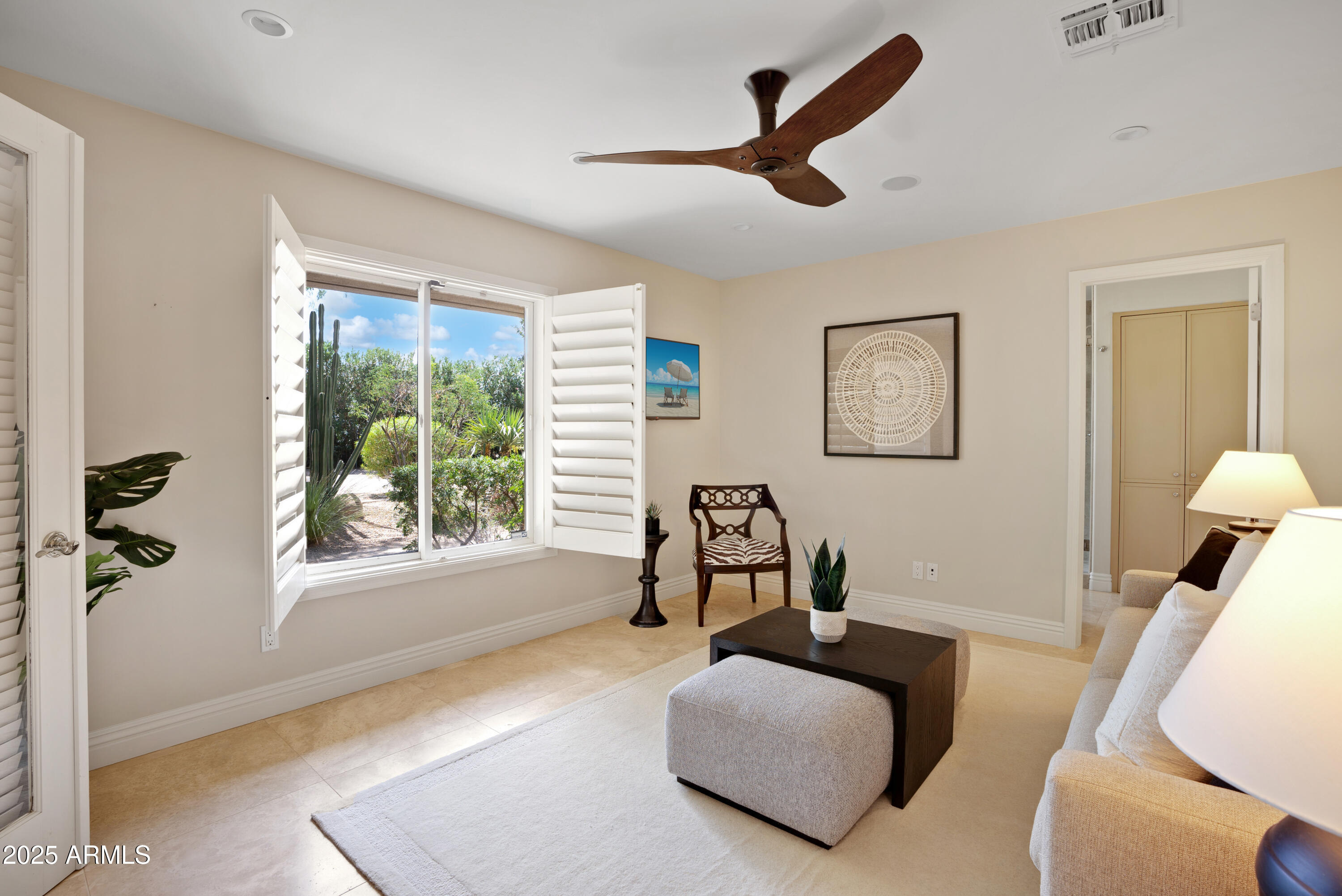 9236 North 52nd Place Paradise Valley, AZ 85253 - Photo 35 of 56 a living room with furniture and a window