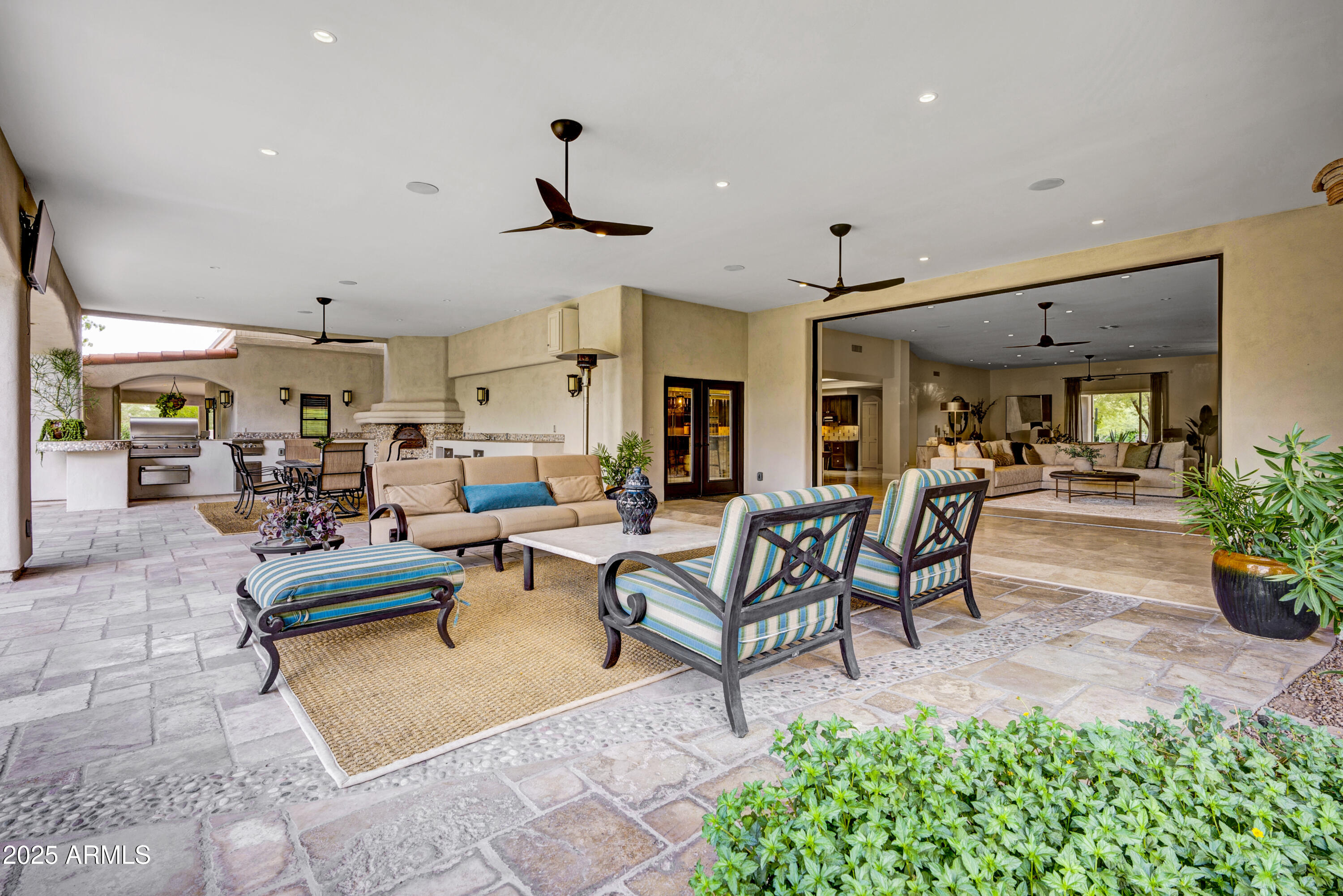 9236 North 52nd Place Paradise Valley, AZ 85253 - Photo 36 of 56 a living room with furniture and a potted plant