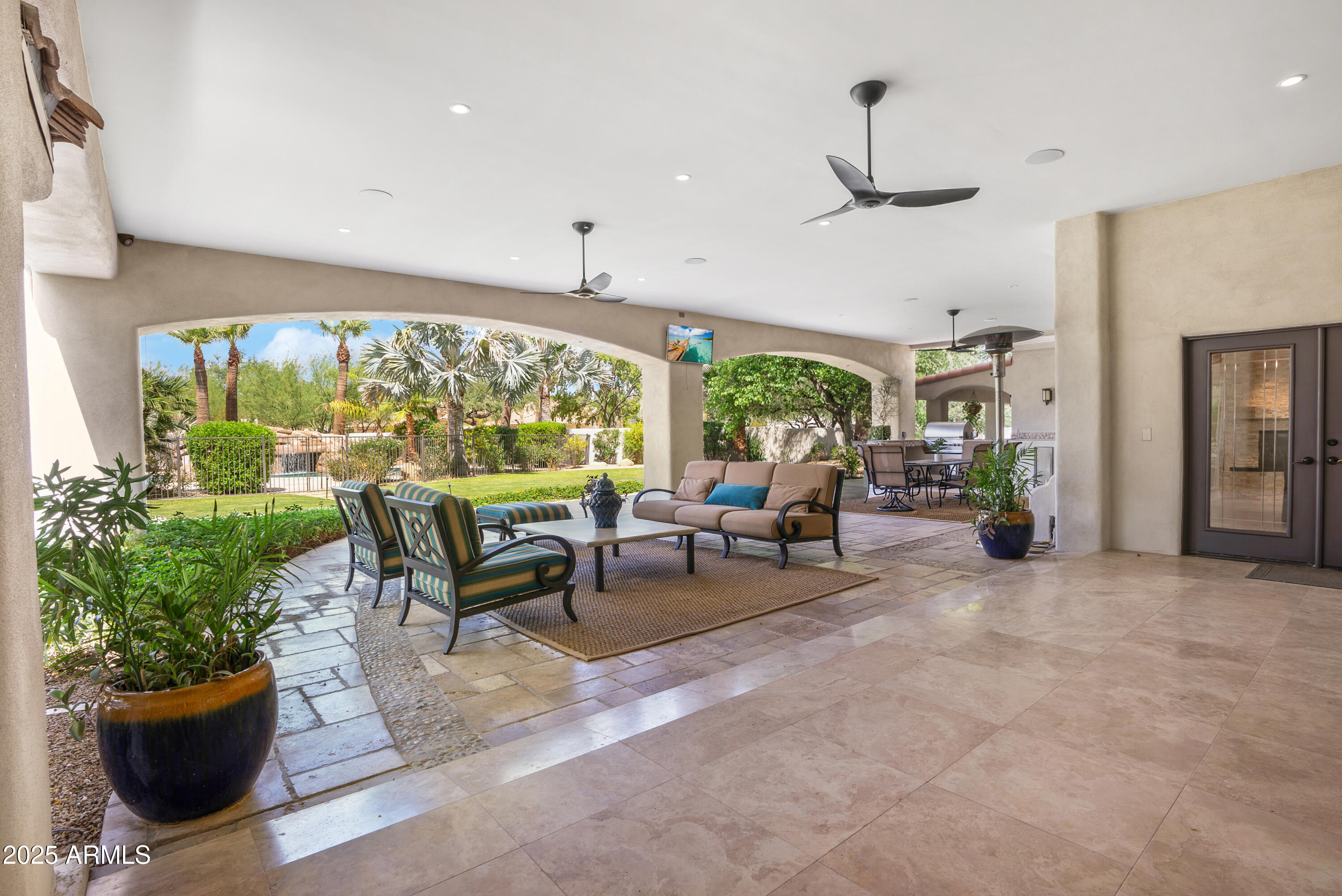 9236 North 52nd Place Paradise Valley, AZ 85253 - Photo 37 of 56 a living room with furniture and a large window