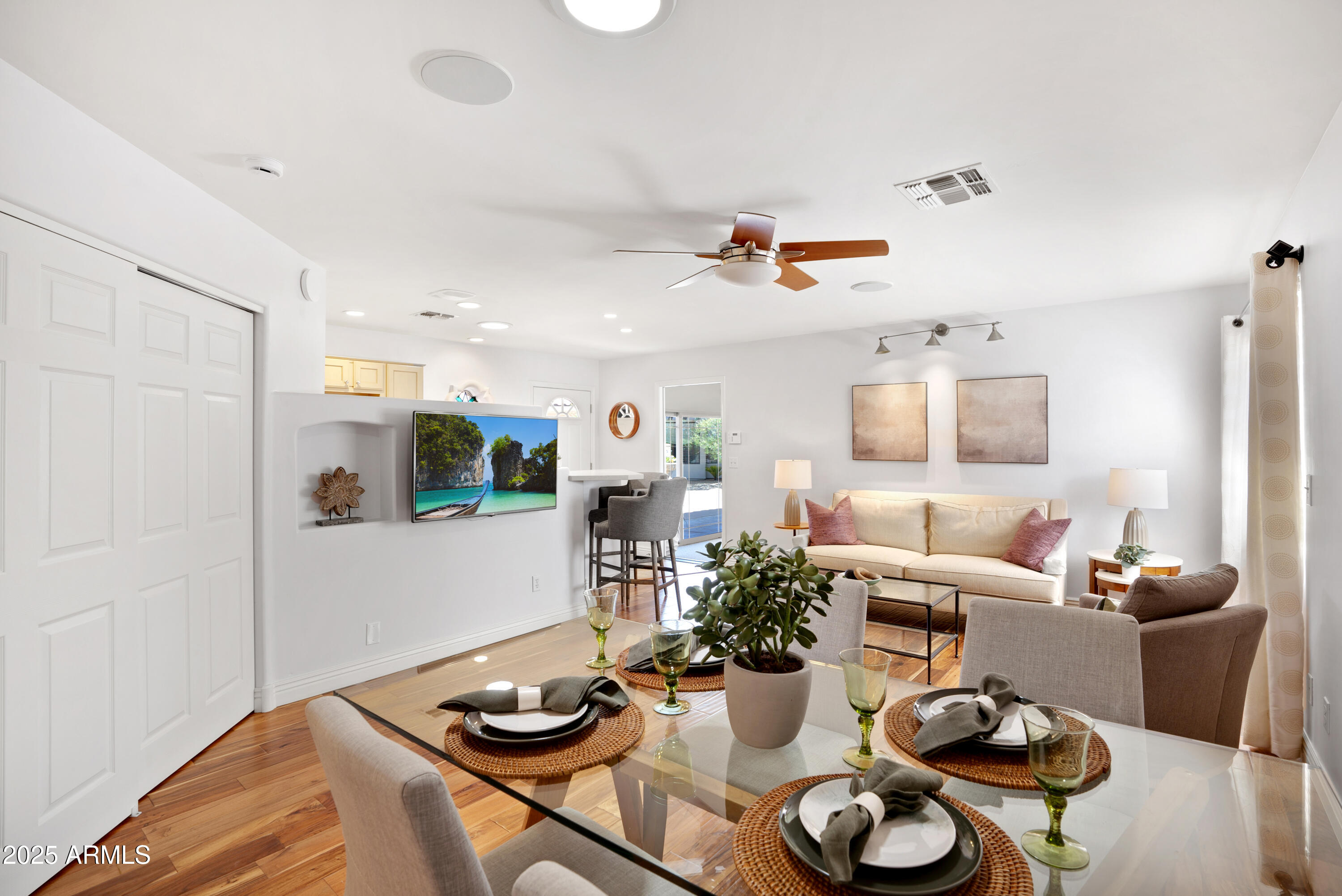 9236 North 52nd Place Paradise Valley, AZ 85253 - Photo 39 of 56 a living room with furniture and flat screen tv