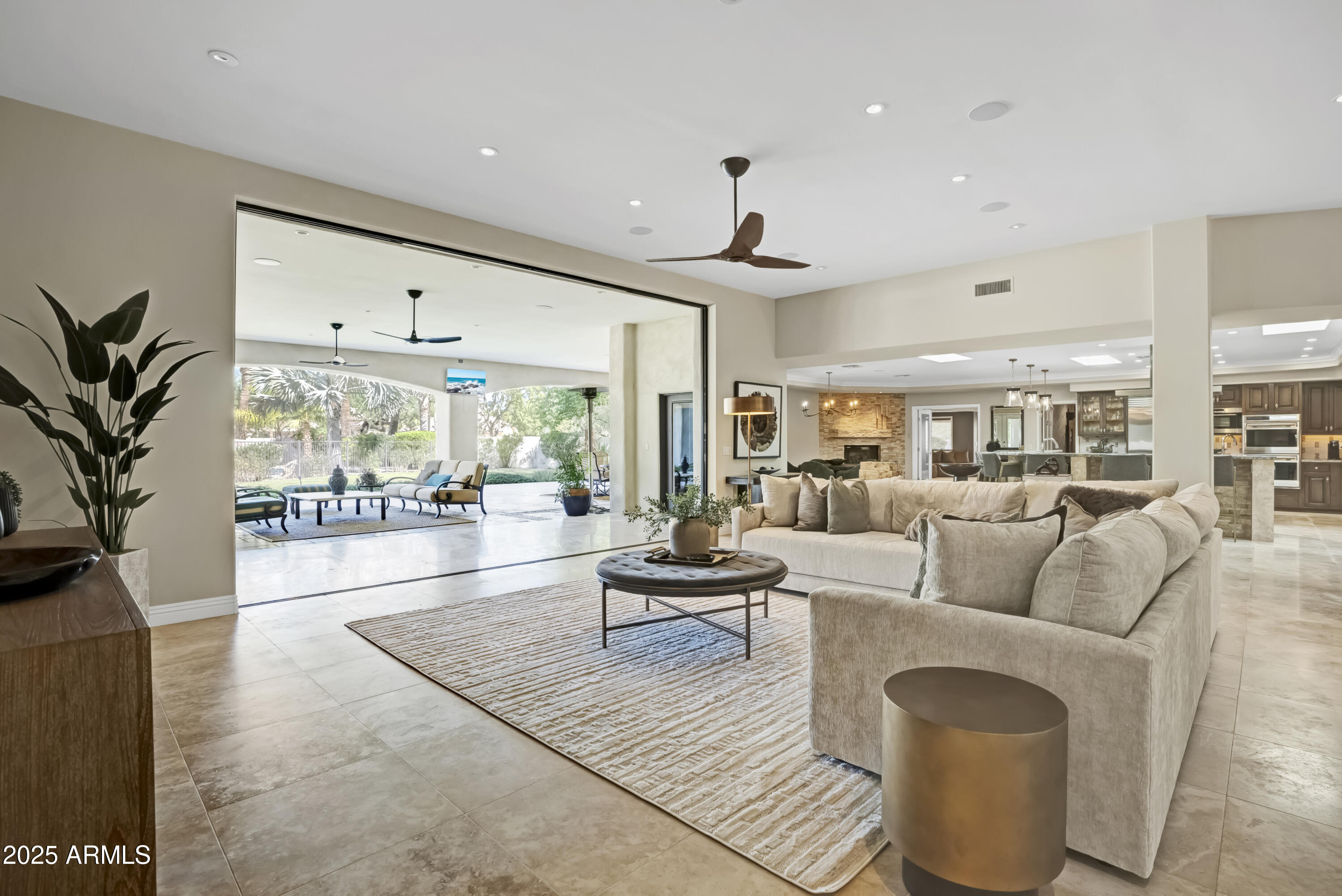 9236 North 52nd Place Paradise Valley, AZ 85253 - Photo 6 of 56 a living room with furniture and a large window