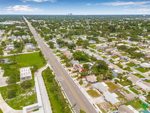 a view of residential houses with outdoor space